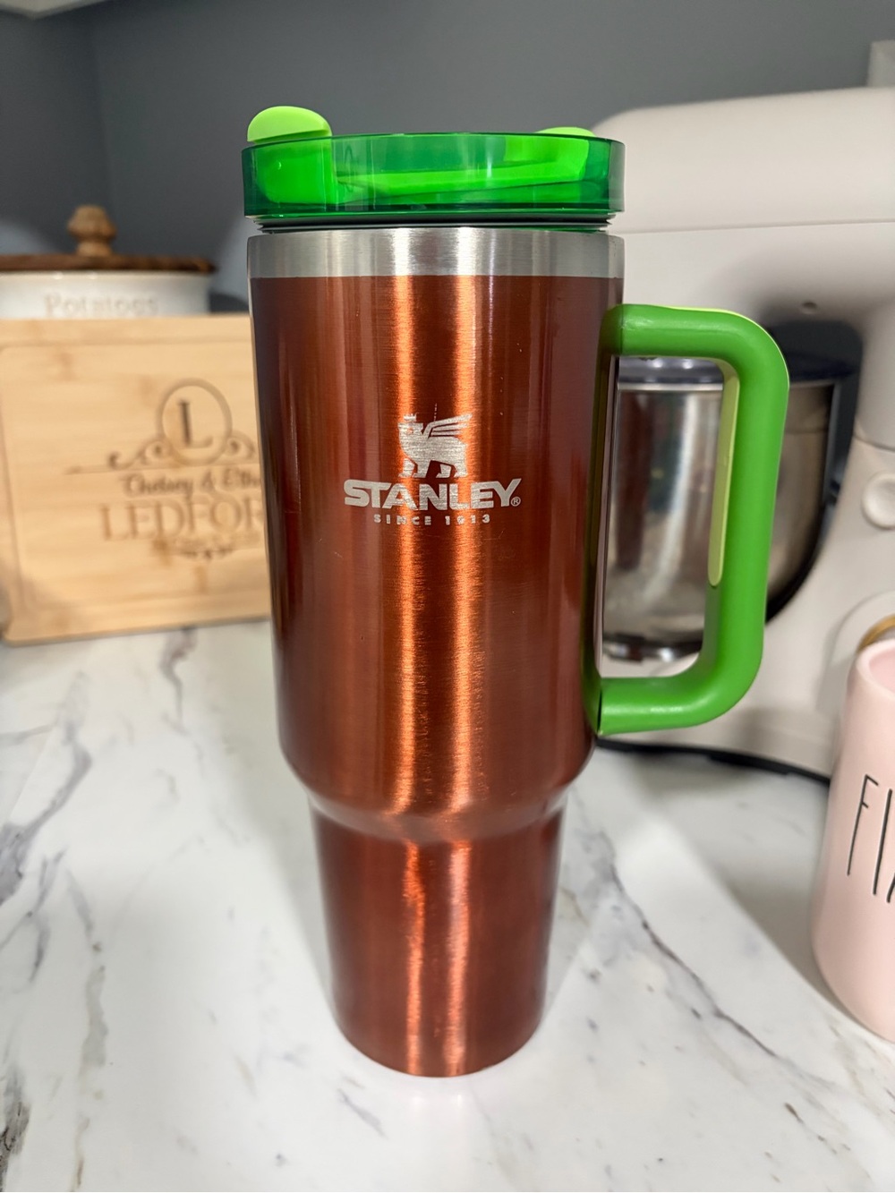 Stanley Copper Travel Mug with Bright Green Handle and Lid